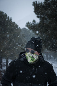 Portrait of man in snow