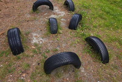 Tires buried in the ground to the obstacle course