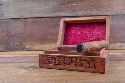 Close-up of box on wooden table