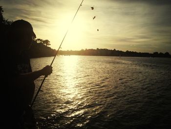 Scenic view of sunset over river