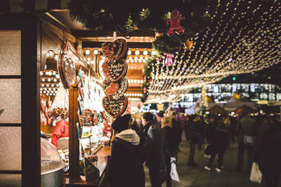 People on street at night during christmas