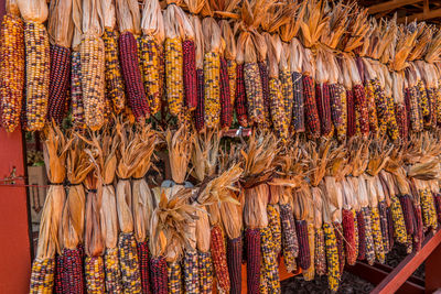 Multi colored candies for sale at market stall