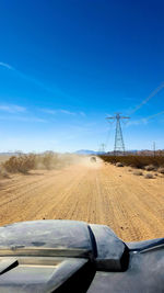 Road seen through car windshield