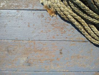 Low angle view of rope on wall