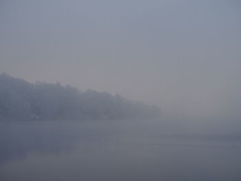 Scenic view of fog against sky