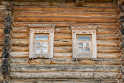 Low angle view of window on old building