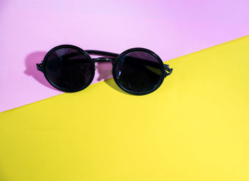 Close-up of sunglasses on glass