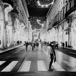 People walking on city street