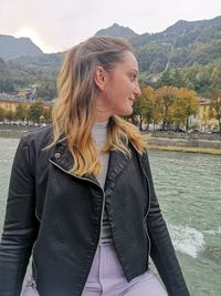 Beautiful woman standing in lake