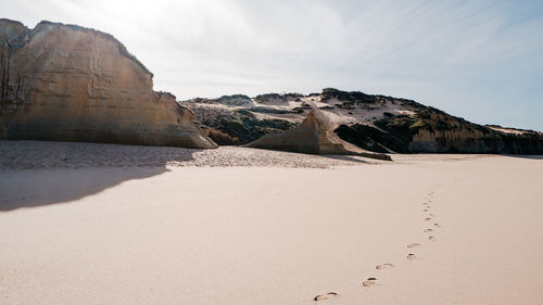 Scenic view of desert against sky