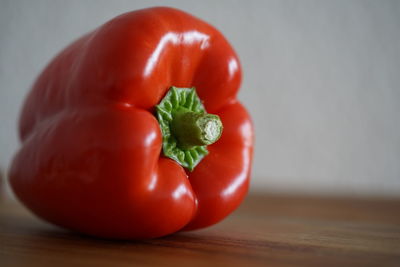 Close-up of red bell peppers on table