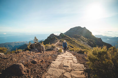 Hiking trail under the encumeada baixa mountain with a destination on madeiras, pico ruivo