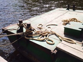 Close-up of ship moored in water