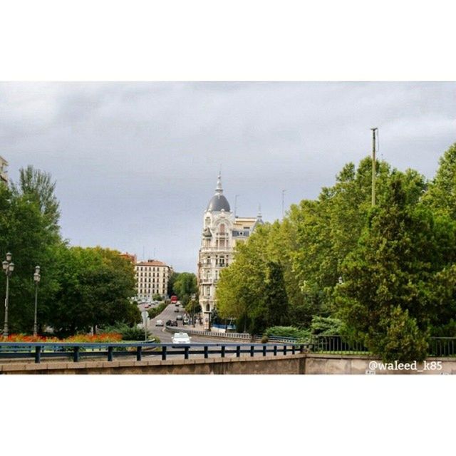 architecture, building exterior, built structure, tree, sky, transfer print, tower, place of worship, famous place, religion, travel destinations, church, city, spirituality, tourism, auto post production filter, travel, spire, dome