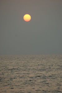 Scenic view of sunset over sea