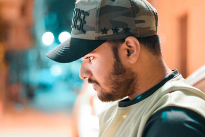 Portrait of young man looking away