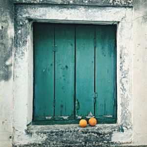 Closed wooden windows of house