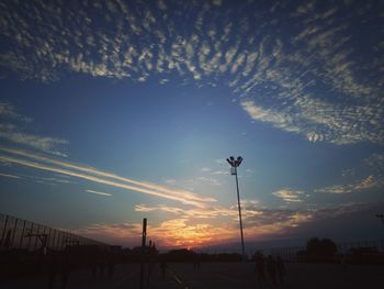 Silhouette trees against sky during sunset