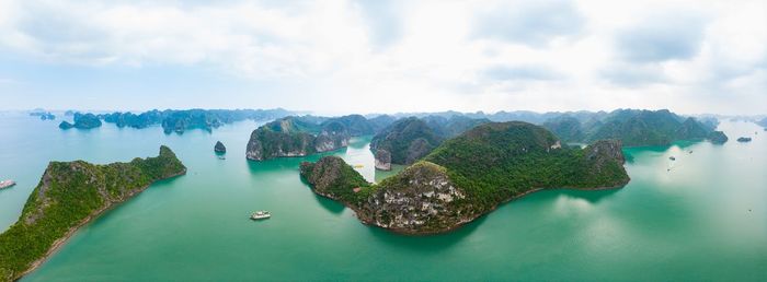 Panoramic view of bay against sky