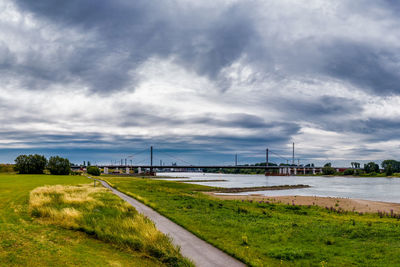 Bridge over river against sky