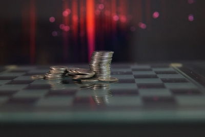 Close-up of coins on table