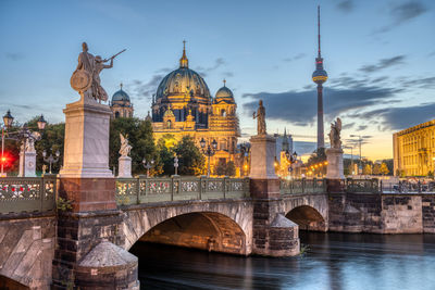 The cathedral, the tv tower and the schlossbruecke in berlin at dawn