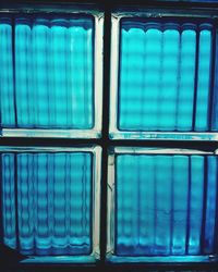 Full frame shot of blue stained glass window