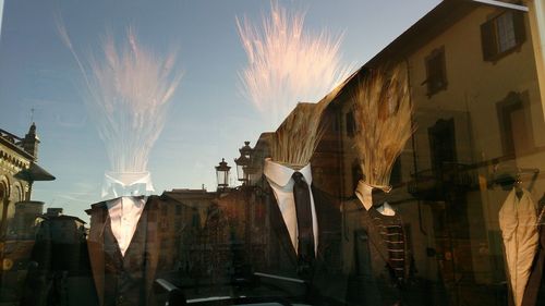 Low angle view of temple against sky in city