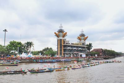 View of buildings against cloudy sky