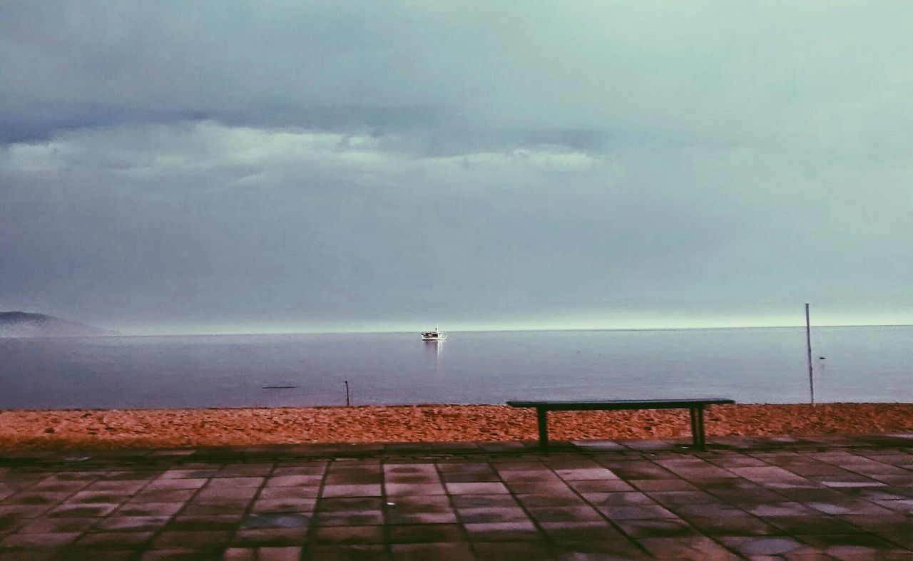 sea, horizon over water, water, sky, tranquil scene, tranquility, scenics, cloud - sky, beauty in nature, nature, beach, cloudy, idyllic, shore, pier, cloud, outdoors, weather, built structure, calm