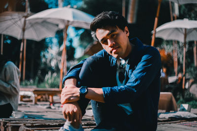 Full length of young man standing outdoors