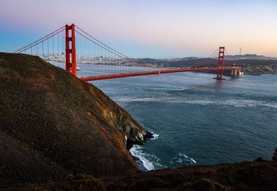 View of suspension bridge over sea