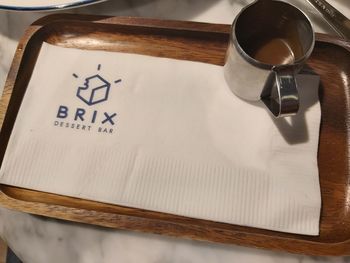 High angle view of coffee cup on table