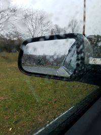 Wet car window during rainy season