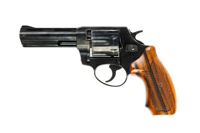 Close-up of gun on white background