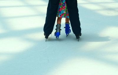 Close-up of woman against blue sky