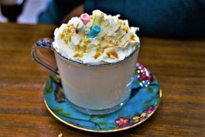 Close-up of coffee cup on table