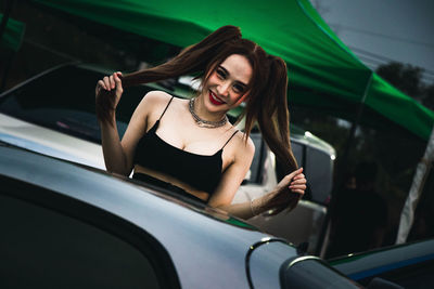 Portrait of woman in car