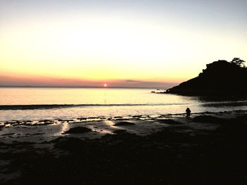 Scenic view of beach during sunset