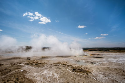 Scenic view of clouds over landscape