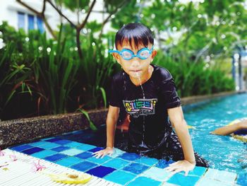 Portrait of boy in swimming pool