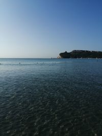 Scenic view of sea against clear sky