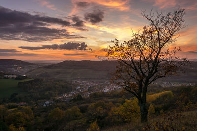 Scenic view of landscape against sky during sunset