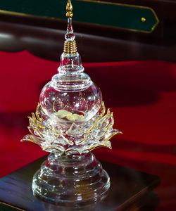 Close-up of illuminated decoration on table