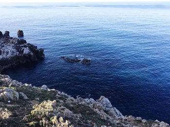 High angle view of a rock formation in sea