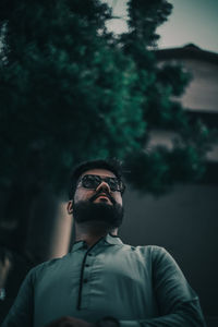 Portrait of young man looking away