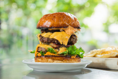 Close-up of burger in plate on table