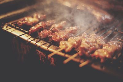 Close-up of pork on barbecue