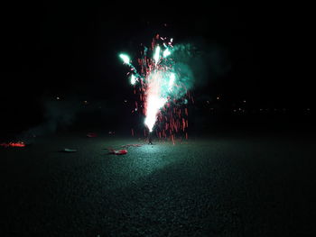 Firework display at night