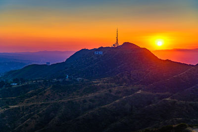 Scenic view of mountains against sky during sunset